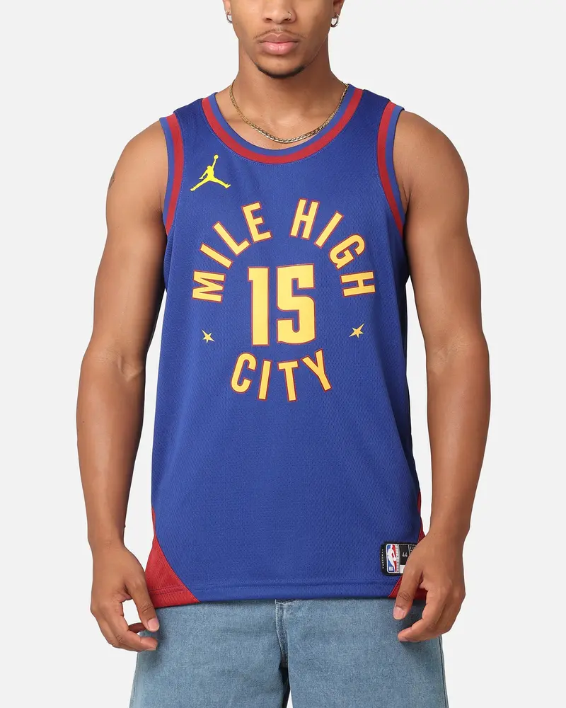 Jordan Denver Nuggets Nikola Jokić Statement Edition 2022/23 Dri-Fit Swingman Jersey Rush Blue/Team Crimson 1