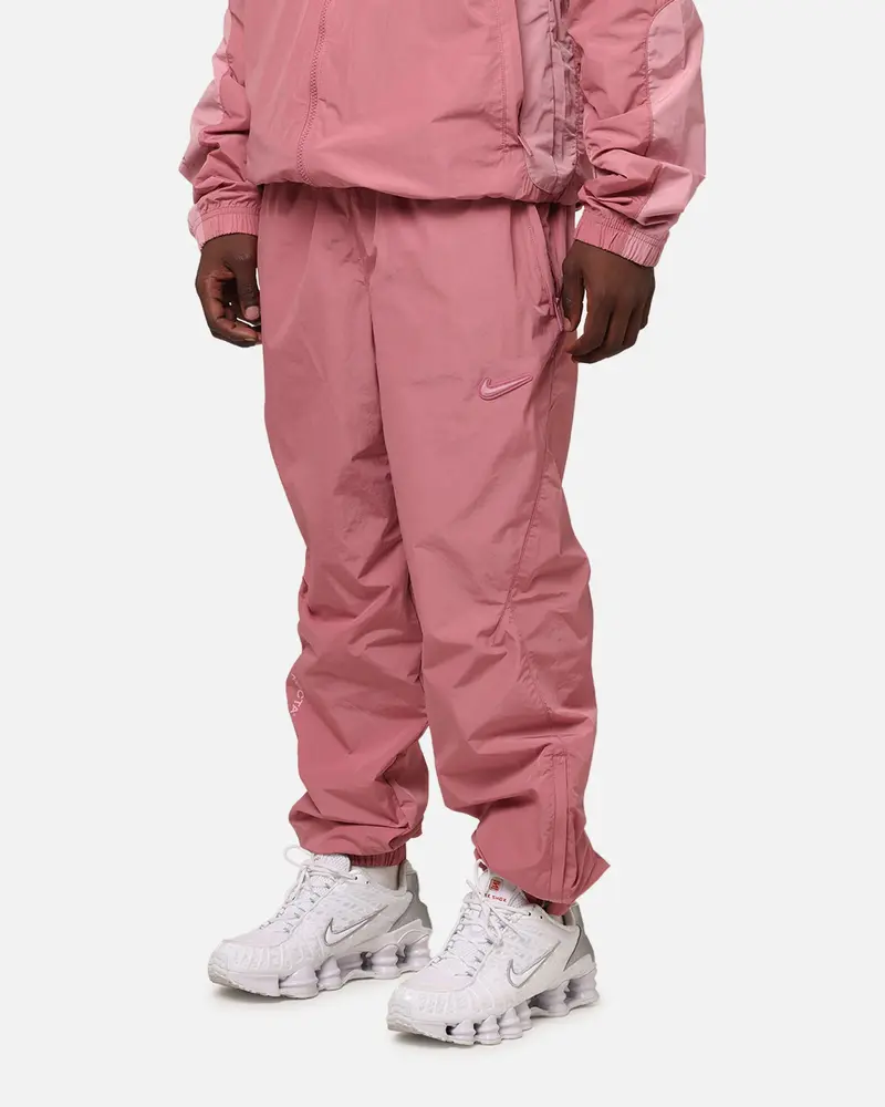 Nike Nocta Northstar Nylon Track Pants Desert Berry 1